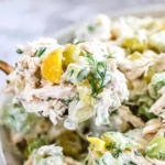Spoonful of Pepperoncini Chicken Salad with shredded chicken, celery, dill, and pepperoncini peppers—creamy, tangy, and perfect for easy lunches.